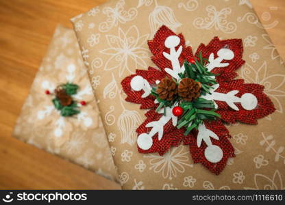 Christmas presents with decorations on the wooden surface nobody. Christmas presents with decorations on the wooden surface
