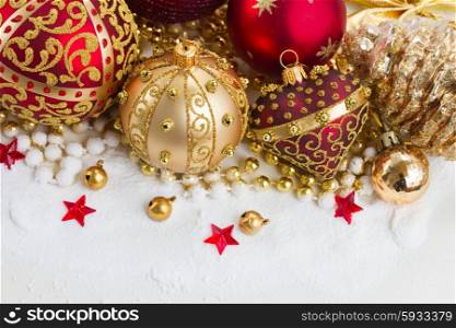 christmas red and golden heart with evegreen tree . christmas red heart and golden ball with evegreen tree in snow