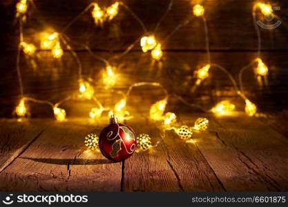 Christmas red bauble with lights background