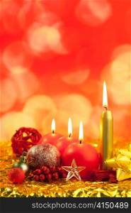 christmas red candles on golden bokeh lights background