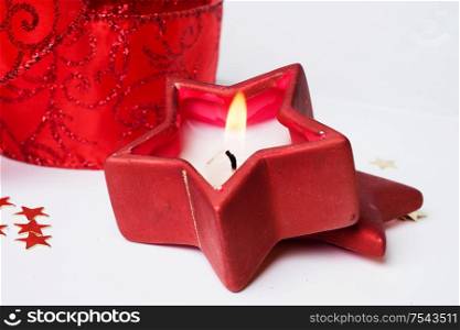 Christmas red decoration with candle around white background