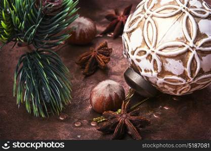 Christmas retro decoration. Old-fashioned glass soviet christmas fur-tree toys on a bronze retro background.Christmas holidays