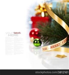 Christmas ribbon bow with christmas decorations on white background