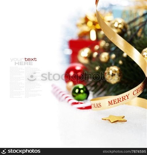 Christmas ribbon bow with christmas decorations on white background