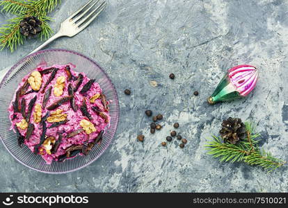 Christmas salad with beets, prunes and nuts. Beetroot salad with prunes