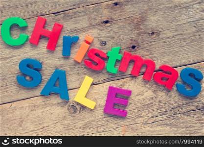 Christmas Sale written in a colorful plastic letters
