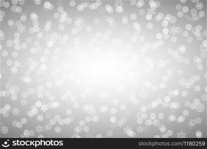 Christmas silver shiny background with snowflakes and lens flare.. Christmas silver shiny background with snowflakes and lens