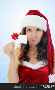 Christmas smiling woman in red santa cap. isolated on a white background