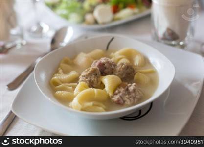 Christmas soup with meat and pasta shells