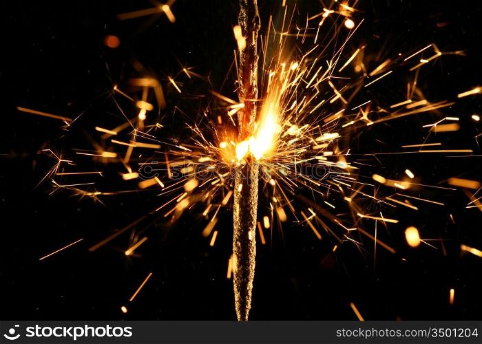 christmas sparkler firework flame on black
