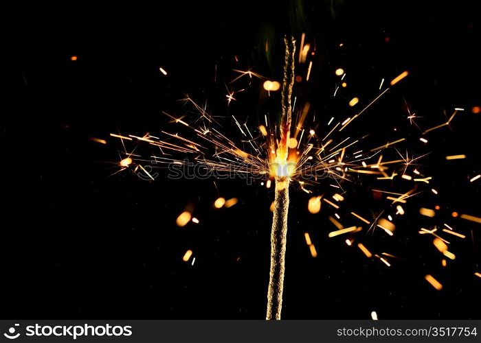 christmas sparkler firework flame on black
