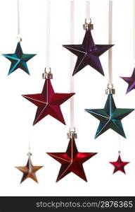 Christmas star ornaments on white background