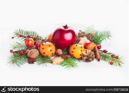 Christmas sweet decor - fir and tangerins, apple and spices