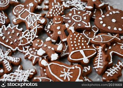 Christmas sweets. Beautiful hand decorated traditional Czech Christmas gingerbread cookies with icing.