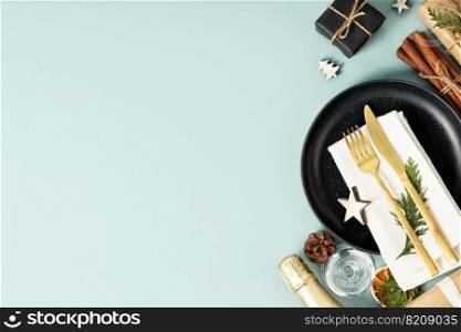 Christmas table place setting on blue background. Eco friendly zero waste Christmas dinner top view copy space