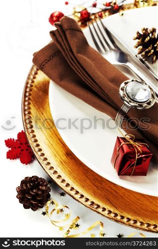 Christmas table place setting with christmas decorations