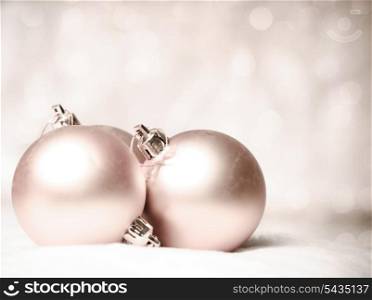 christmas things as ctrobiles and gold ball on white