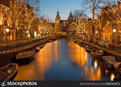 Christmas time in Amsterdam with the Rijksmuseum in Netherlands at twilight