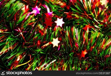 christmas tinsel with stars close up