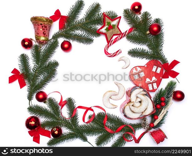Christmas top view frame composition with copy space - branches, candy cookies and balls. High quality photo. Christmas top view frame composition with copy space - branches, candy cookies and balls