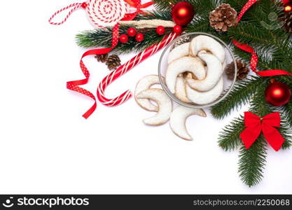 Christmas top view frame composition with copy space - branches, candy cookies and balls. High quality photo. Christmas top view frame composition with copy space - branches, candy cookies and balls