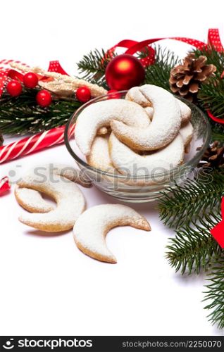 Christmas top view frame composition with copy space - branches, candy cookies and balls. High quality photo. Christmas top view frame composition with copy space - branches, candy cookies and balls
