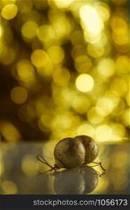 Christmas toy on a background of Golden background with beautiful bokeh