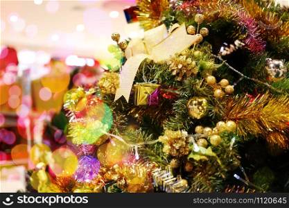 Christmas tree and bokeh of holiday background and have copy space for design in your work concept.