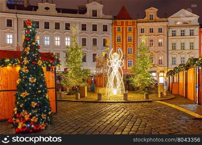 Christmas tree and holiday decorations in the Old Town in the magical city of Prague at night, Czech Republic