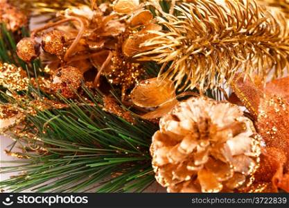 Christmas tree branch with cones closeup image.