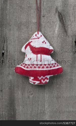 Christmas tree decoration on rustic wooden background