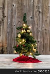 Christmas Tree decoration on rustic wooden background