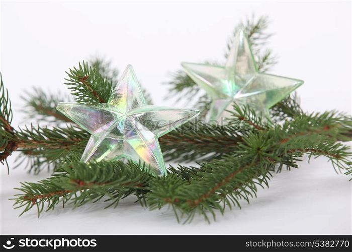 Christmas tree decorations on branch