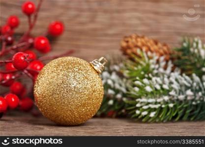 Christmas tree decorations on wooden background. Shallow depth of field
