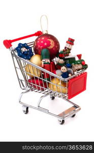 Christmas-tree decorations: shopping cart, full of Christmas toys and baubles, isolated on white background&#xA;