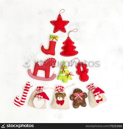 Christmas tree ecoration and gift bags. Holidays background on white