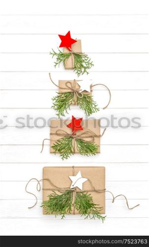 Christmas tree from gift boxes. Holidays background flat lay