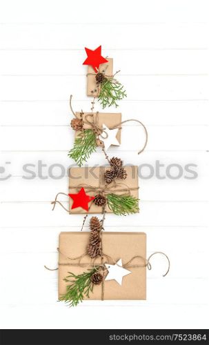 Christmas tree from gift boxes. Holidays background flat lay