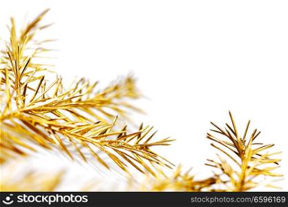 Christmas tree golden branch isolated on white background