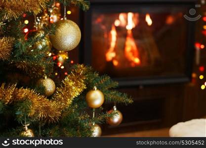 Christmas tree in interior with fireplace