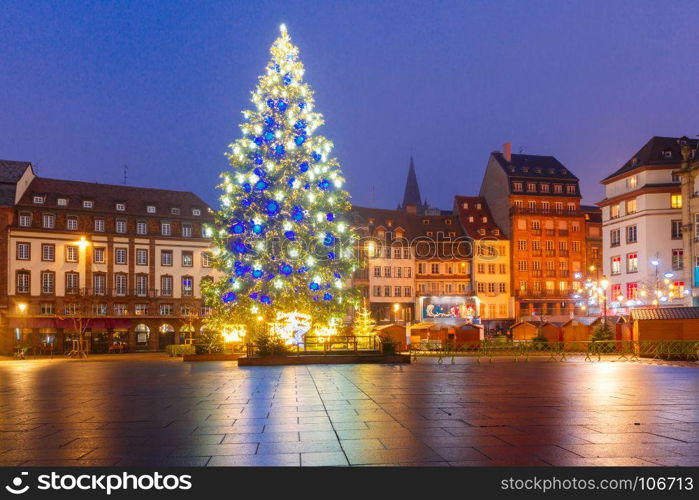 Christmas Tree in Strasbourg, Alsace, France. Christmas Tree Decorated and illuminated on the Place Kleber in Old Town of Strasbourg at night, Alsace, France