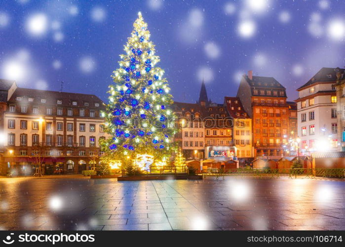 Christmas Tree in Strasbourg, Alsace, France. Christmas Tree Decorated and illuminated on the Place Kleber in Old Town of Strasbourg at night, Alsace, France