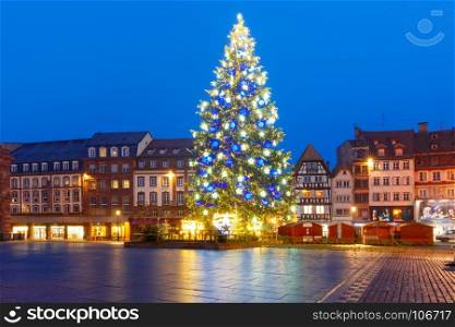 Christmas Tree in Strasbourg, Alsace, France. Christmas Tree Decorated and illuminated on the Place Kleber in Old Town of Strasbourg at night, Alsace, France