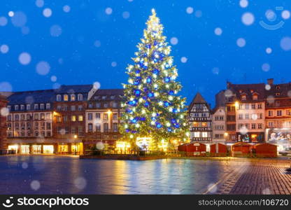 Christmas Tree in Strasbourg, Alsace, France. Christmas Tree Decorated and illuminated on the Place Kleber in Old Town of Strasbourg at night, Alsace, France