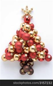 Christmas Tree Made From Baubles Against White Background