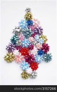 Christmas Tree Made From Gift Bows Against White Background