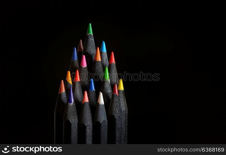 Christmas tree made of black wooden pencils