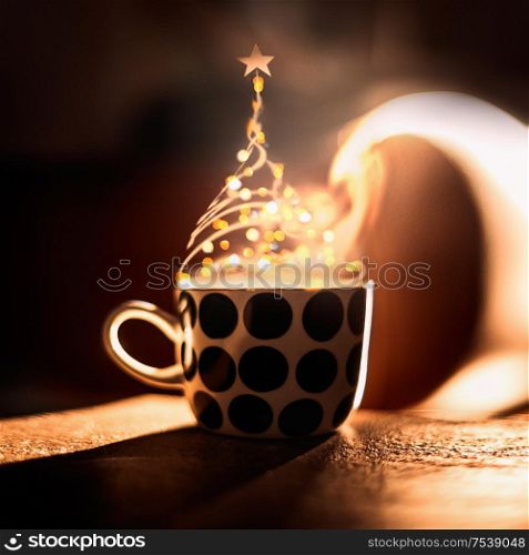 Christmas tree made with steam and bokeh of hot drink in cup . Creative winter holidays. Cozy home