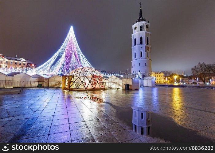 Christmas tree on the Cathedral Square and Cathedral Belfry, Vilnius, Lithuania, Baltic states.. Christmas tree in Vilnius, Lithuania