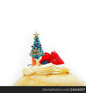 christmas tree on top of a pancake crepe mountain with whipped cream and strawberry